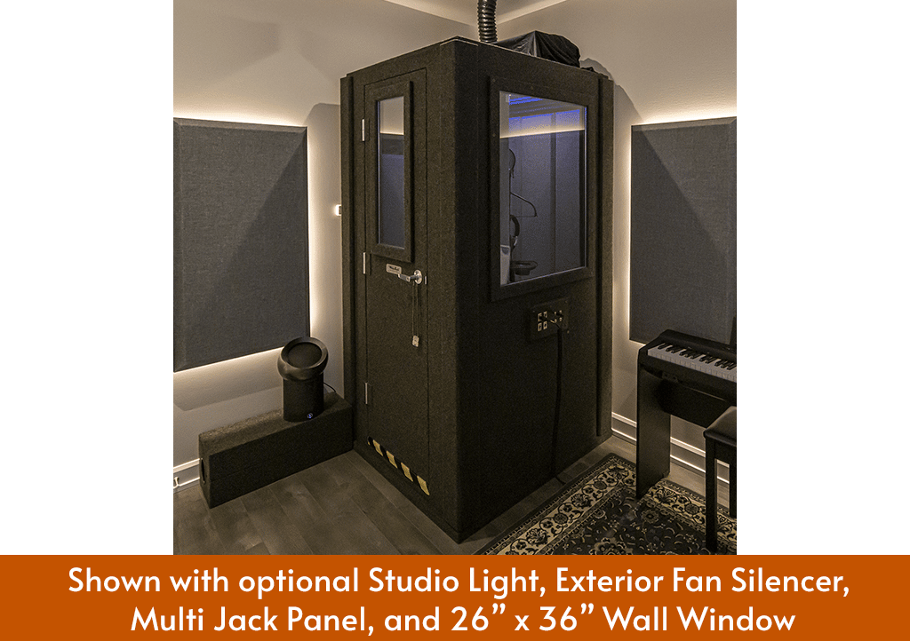 A WhisperRoom MDL 4242 S shown with a wall window, exterior fan silencer, and other various optional features inside of a home studio.