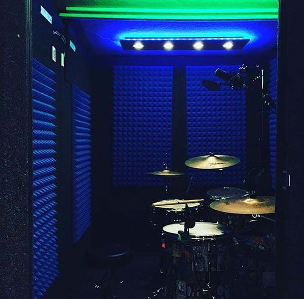 image of a drum kit inside of a whisperroom drum booth
