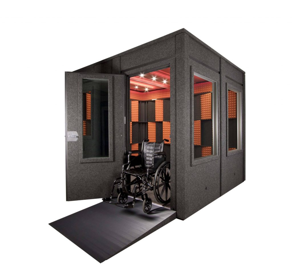 An 8'x8' WhisperRoom with an ADA package and wheelchair on accessible ramp