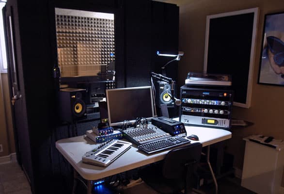 One of WhisperRoom's recording booths with audio racks and recording equipment