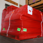 image of a WhisperRoom shrink wrapped on a pallet
