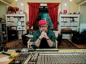 F. Reid Shippen sitting down at his recording studio