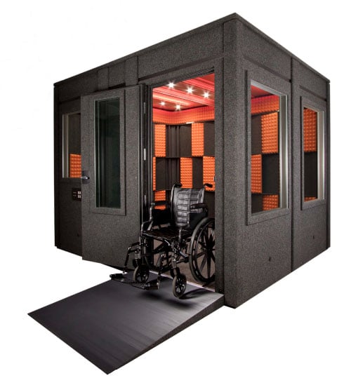 An ADA compliant WhisperRoom with a wheelchair ramp attached
