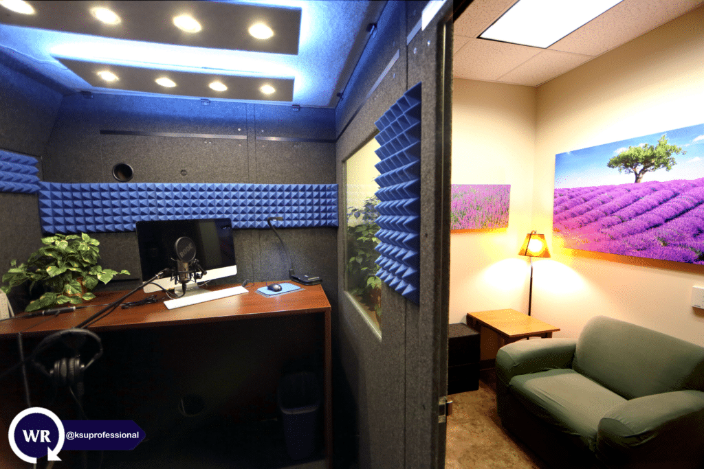 A soundproof booth and a sofa in a production studio at Kennesaw State University