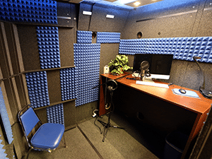 The interior of Kennesaw State University's WhisperRoom with a desk and monitor