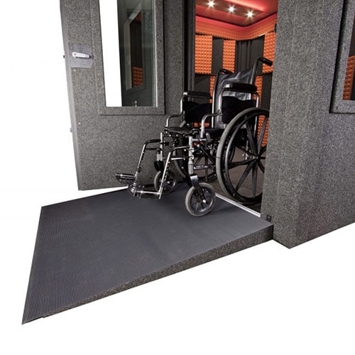 image of a wheelchair and a wheelchair ramp set up with a recording booth