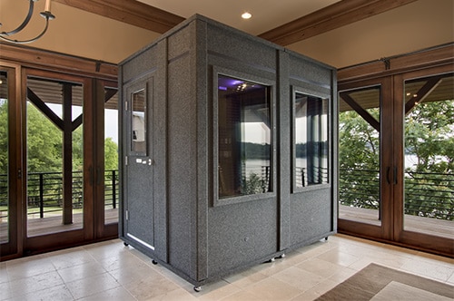 image of a WhisperRoom practice booth inside a home's foyer