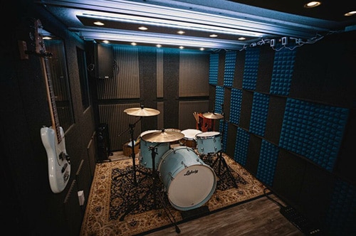 A drumkit inside of a WhisperRoom rehearsal booth