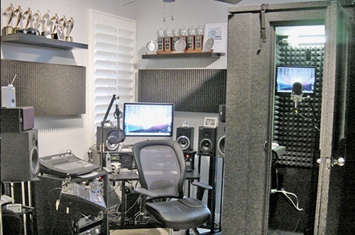 A home studio that is full of trophies, studio gear, and equipment to record voice-overs