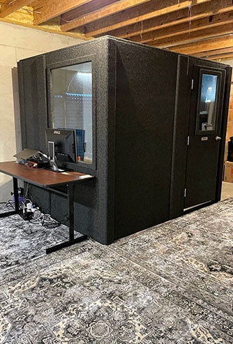 WhisperRoom's MDL 7296 S setup for practice in a home's basement