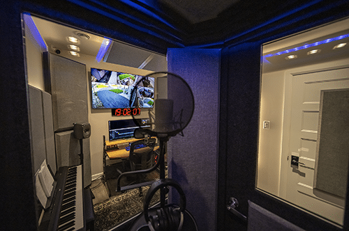 An interior look out the windows of a WhisperRoom vocal booth.
