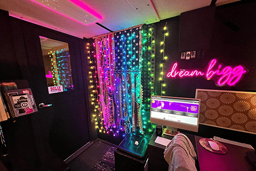 Interior shot of a decorated voice over booth inside of a WhisperRoom MDL 7296 S.