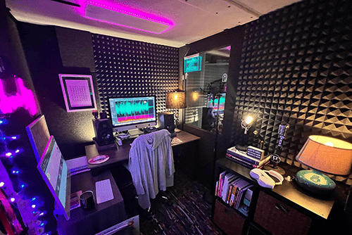 Interior shot of a decorated voice-over booth inside of a WhisperRoom MDL 7296 S.