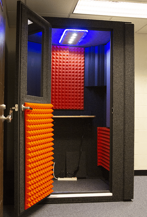 A WhisperRoom Voice Over Basic Package shown from the front with the door open and orange foam.